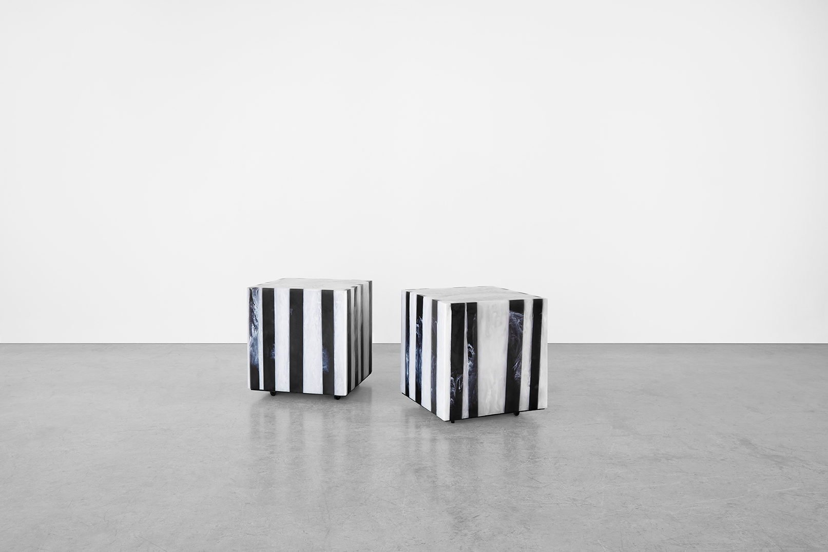 As seen in the Interior Design section of Wallpaper Magazine. these stunning black and white striped bedside tables are incredibly versatile and are available for purchase at Studio Sturdy. Created by Martha Sturdy out of resin.